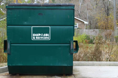Dumpster pad cleaning and sanitation in baton rouge protecting customers before they reach your door